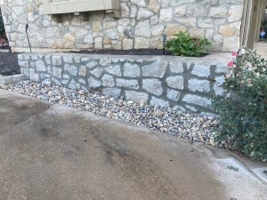 Engineered concrete retaining wall